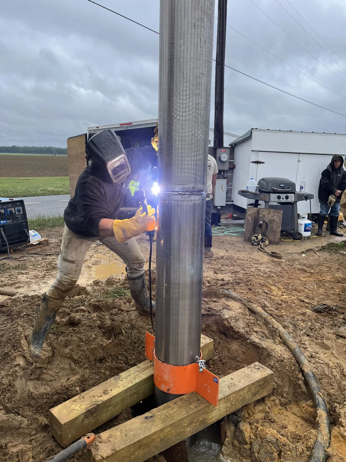 Welding steel well casing at the wellhead